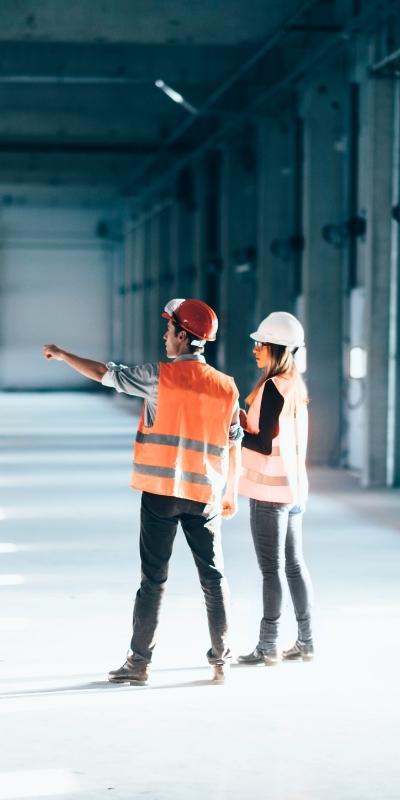 Reliable Image of warehouse workers in hard hats